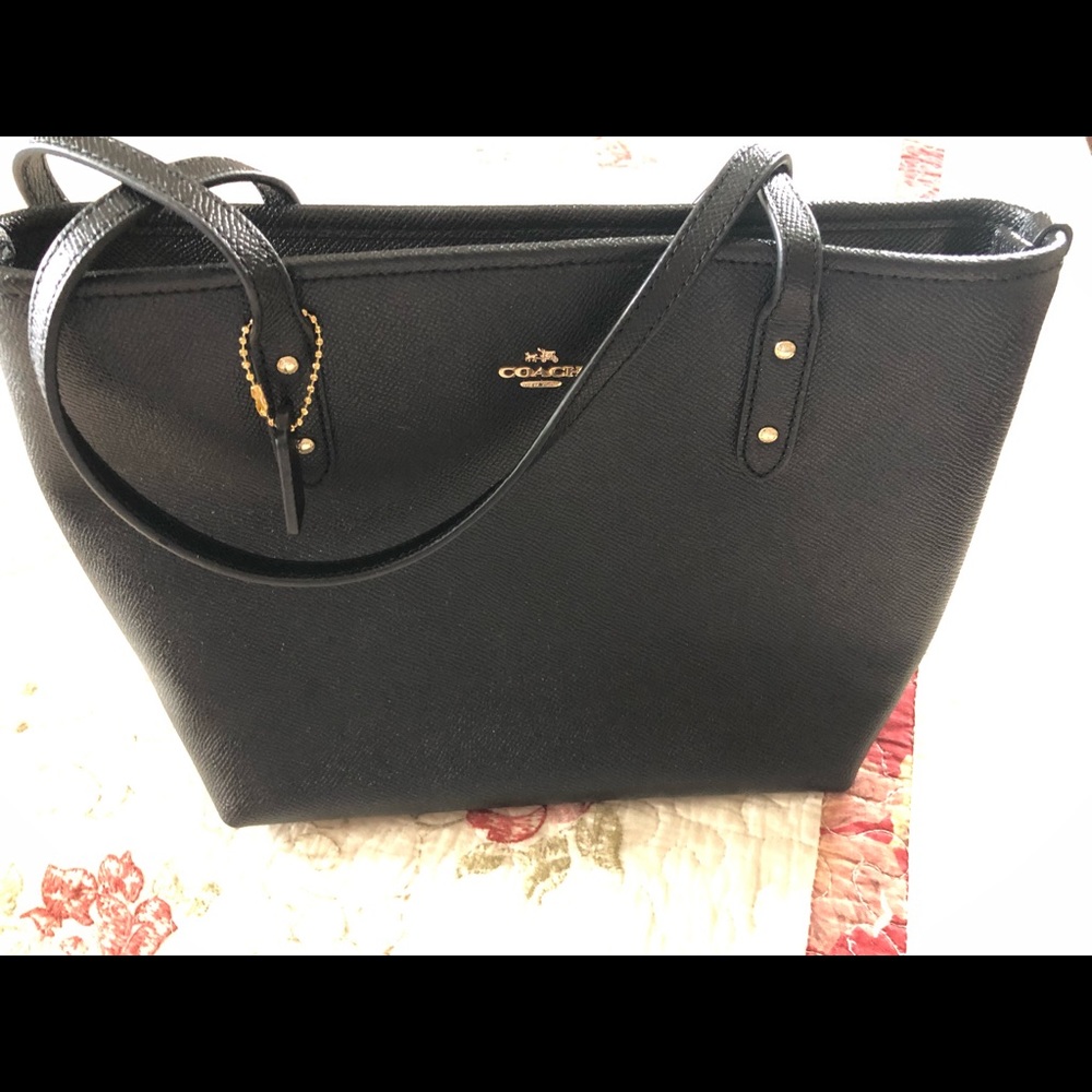 Brand new black coach purse with two straps.